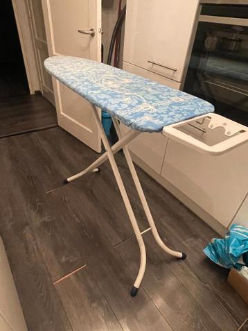Brabantia ironing board with blue floral cover