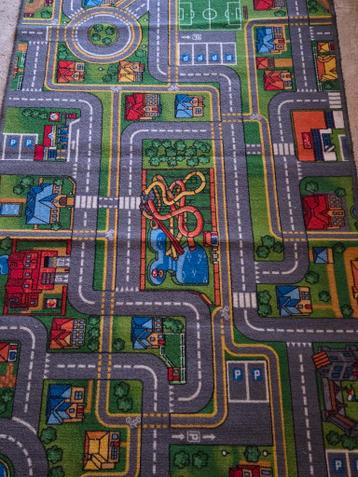 Speelkleed met straten en gebouwen