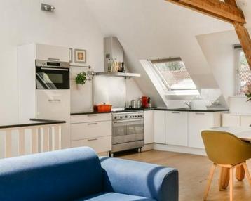 Gratis: Witte keuken +zwart granieten blad incl. apparatuur