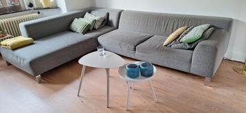 Stoffen grijze hoekbank