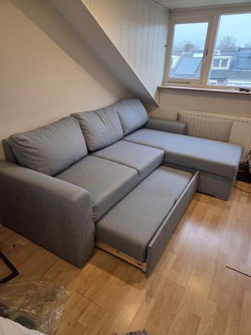 Grijze slaapbank met opbergruimte - Leenbakker