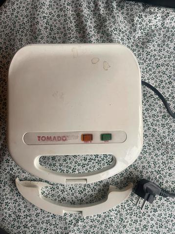 Kapotte Tomado tosti apparaat
