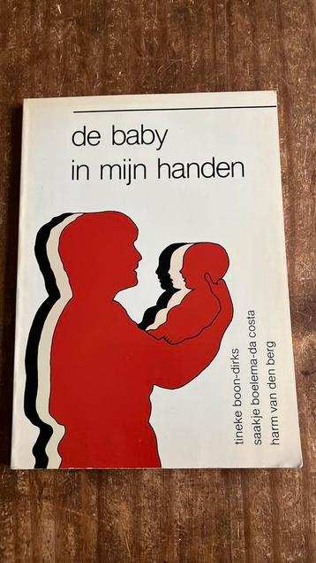 De baby in mijn handen