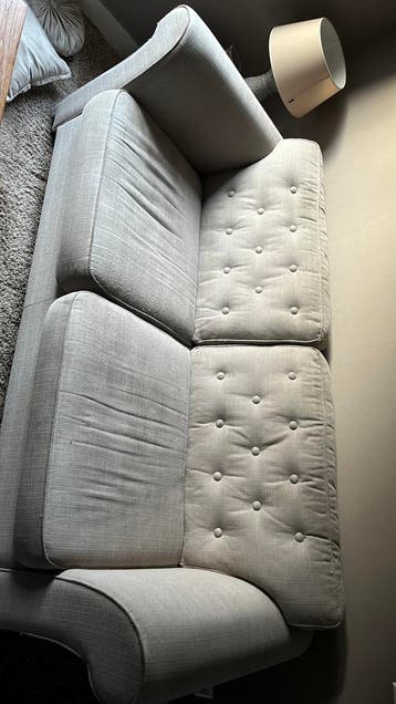 Gebruikte bank zandkleurig