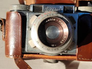 Braun Paxette met leren hoes