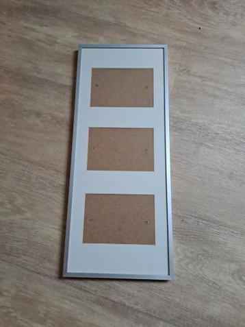 Fotolijst 3 foto's van 10x15 kunnen erin.