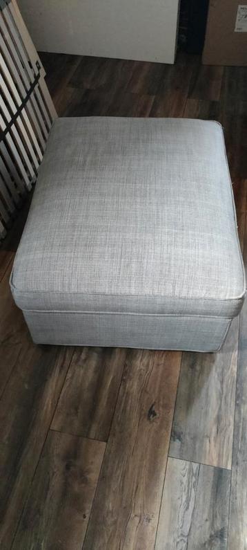 Grijze poef met opbergruimte