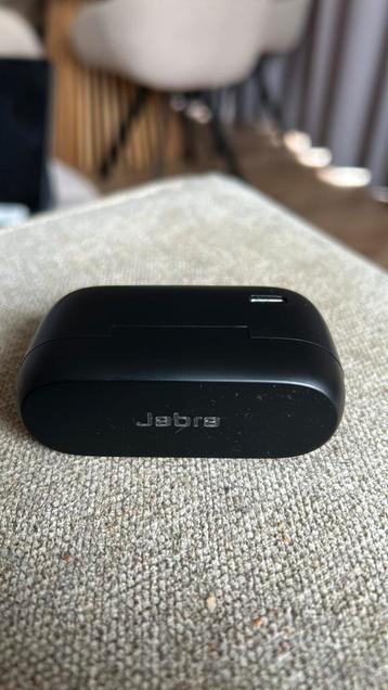 Jabra earbuds earbuds laden niet. Doosje is wel groen