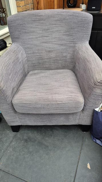 Comfortabele grijze fauteuil