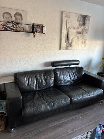 Gratis leren bank set met poef