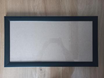 GRATIS: Fotolijst 66x36 cm.