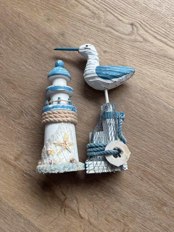 Decoratieve set met vuurtoren en zeemeeuw