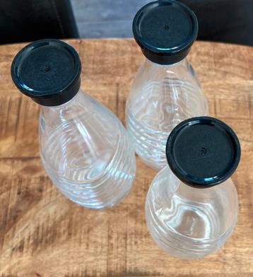 3 glazen Sodastream flessen