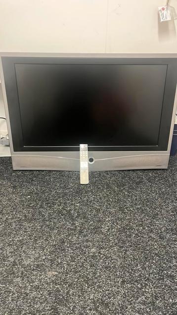 Loewe  Xelos 40,afstands bedien. En  ophangbeugel