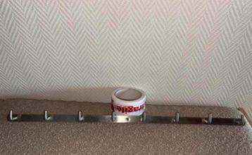 Strakke zilveren wandkapstok