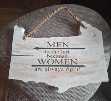 Wit houten bord met de tekst 'Men ...women...'