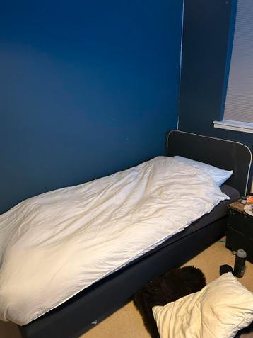 Donkerblauwe boxspring