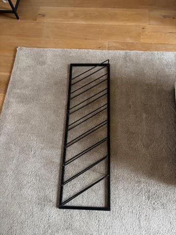 Wijnrek voor aan de muur