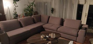 Comfortabele hoekbank met stoffen bekleding - gebruikt