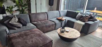 Grote hoekbank antraciet/grijs + hocker