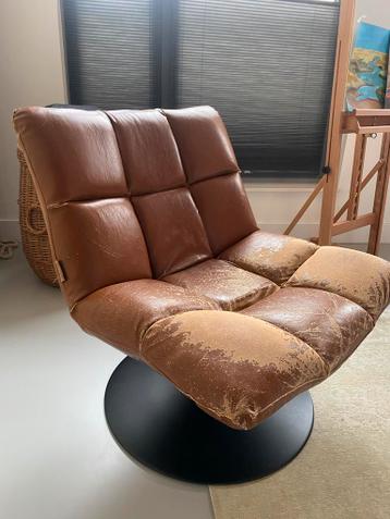 Gratis draaifauteuil - beschadigd leer