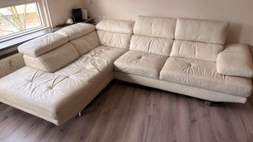 Gratis leren hoekbank met poef - 280x220 cm