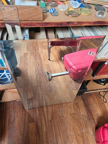 Spiegel facet gesleten