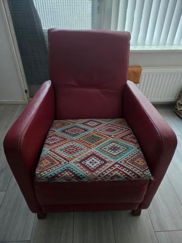 Fauteuil met kussen.