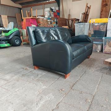 Zwarte leren banken - 2-zits en 3-zits