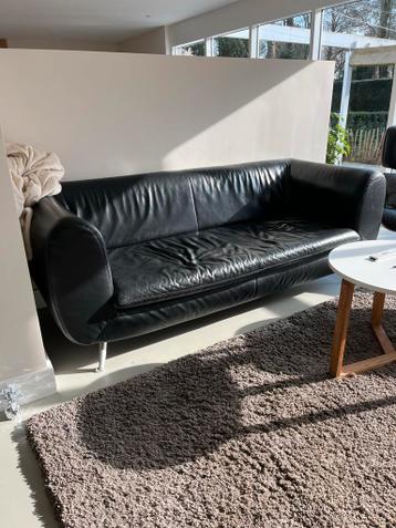 Gratis zwarte leren bank