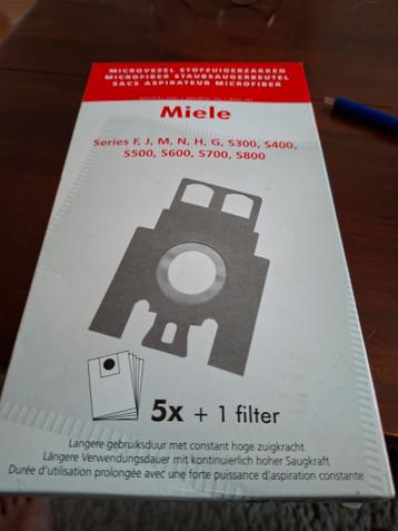 Stofzuiger zakken nieuw en met foto 3 voor laarsen uit doen.