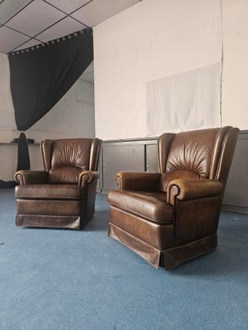 Bruine leren fauteuils