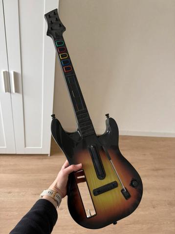 Guitar Hero Wii Gitaar (strumt alleen nog naar boven)