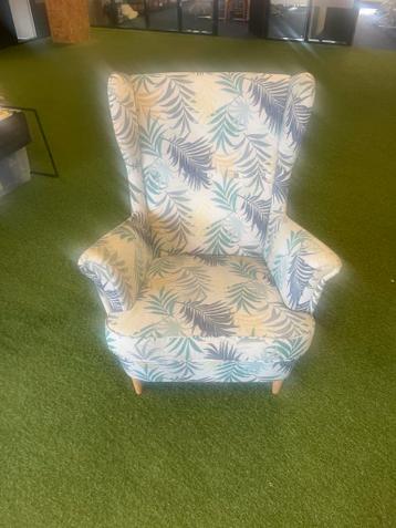 Leuke fauteuil met bladmotief