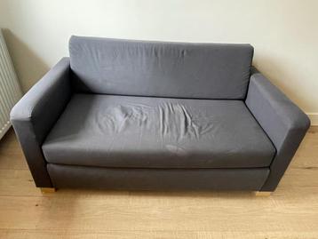 Grijze slaapbank gratis