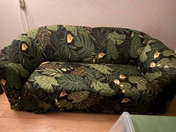 Groene Bank Tweezits met hoes GRATIS