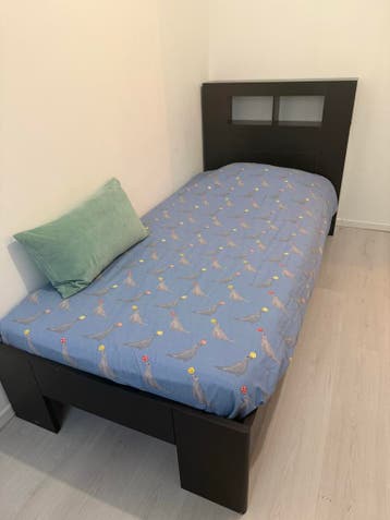 GRATIS Eenpersoonsbed zwart met Auping bodem