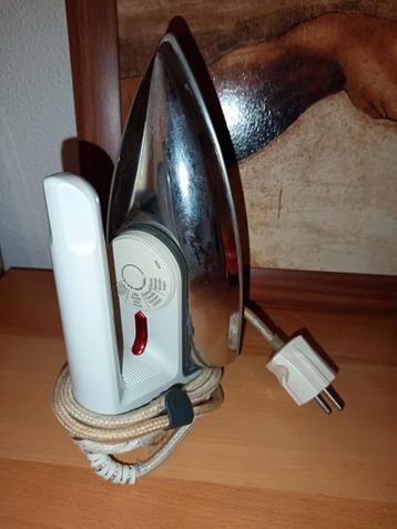 Klein Strijkijzer gebruikt