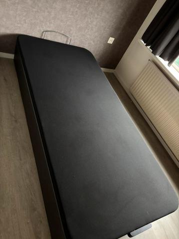 Bed met opbergruimte