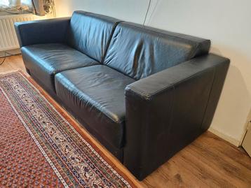 Zwarte leren bank - Stijlvol en comfortabel