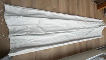 Cremekleurige vouwgordijnen