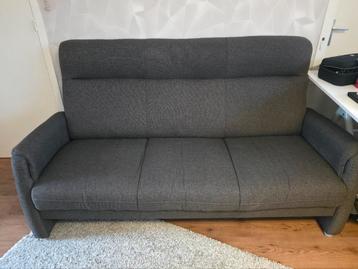 Mooie grijze driepersoonsbank