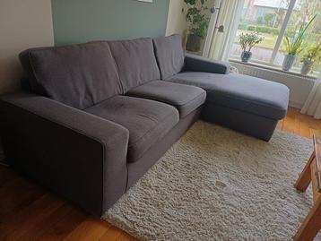 Grijze hoekbank met chaise longue