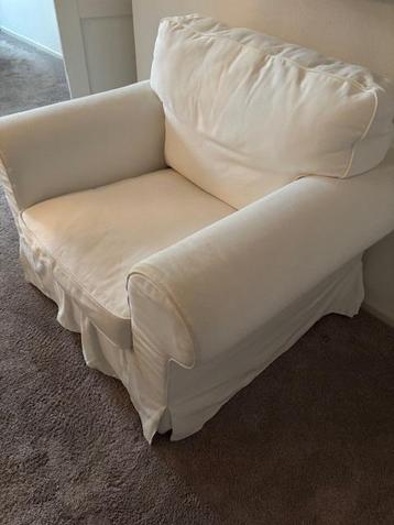 Fauteuil met voetenbank met opbergruimte beige