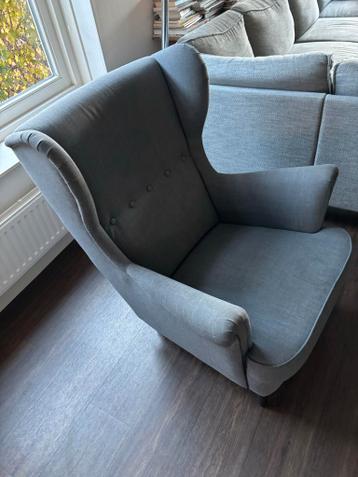 Grijze fauteuil