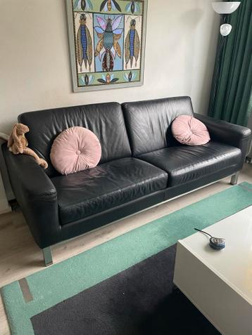 Zwart lederen bankstel, rvs onderstel