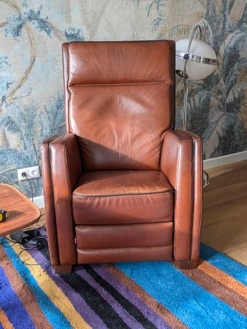 Gratis bruin leren relaxfauteuil elektrisch verstelbaar