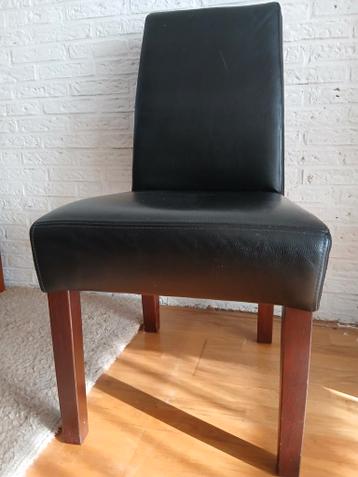 Drie zwarte leren eetkamerstoelen - Gratis!