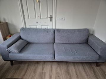 Grijze stoffen bank - Driepersoons