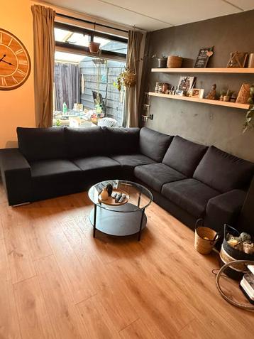 Grote zwarte hoekbank - T.e.a.b.